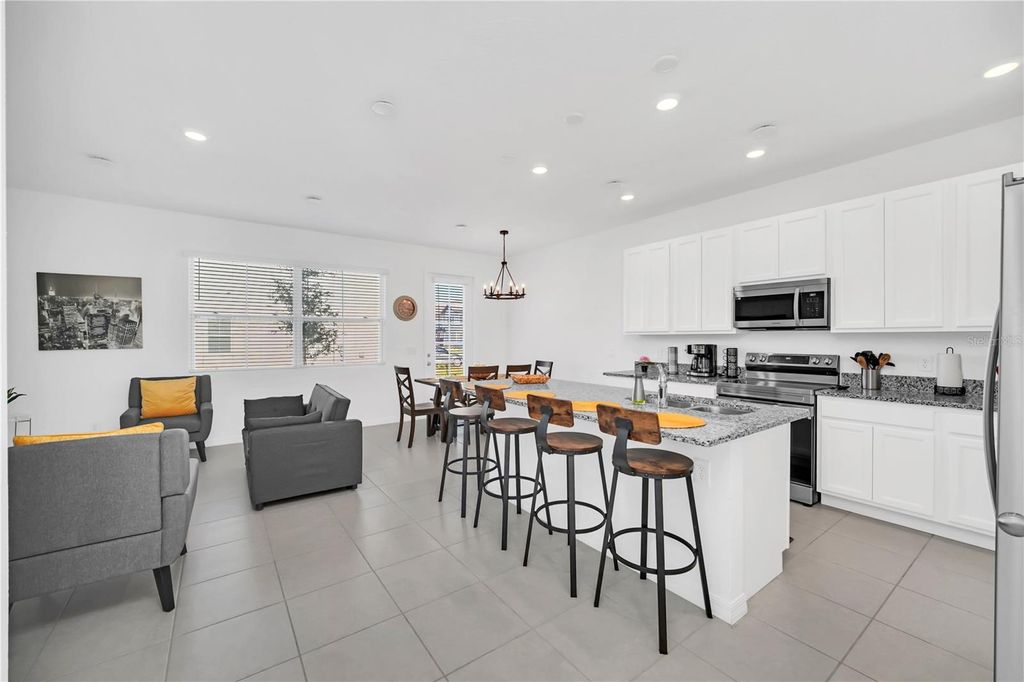 Photo of 808 Longboat Drive, Davenport, FL 33896 (MLS # TB8460779)