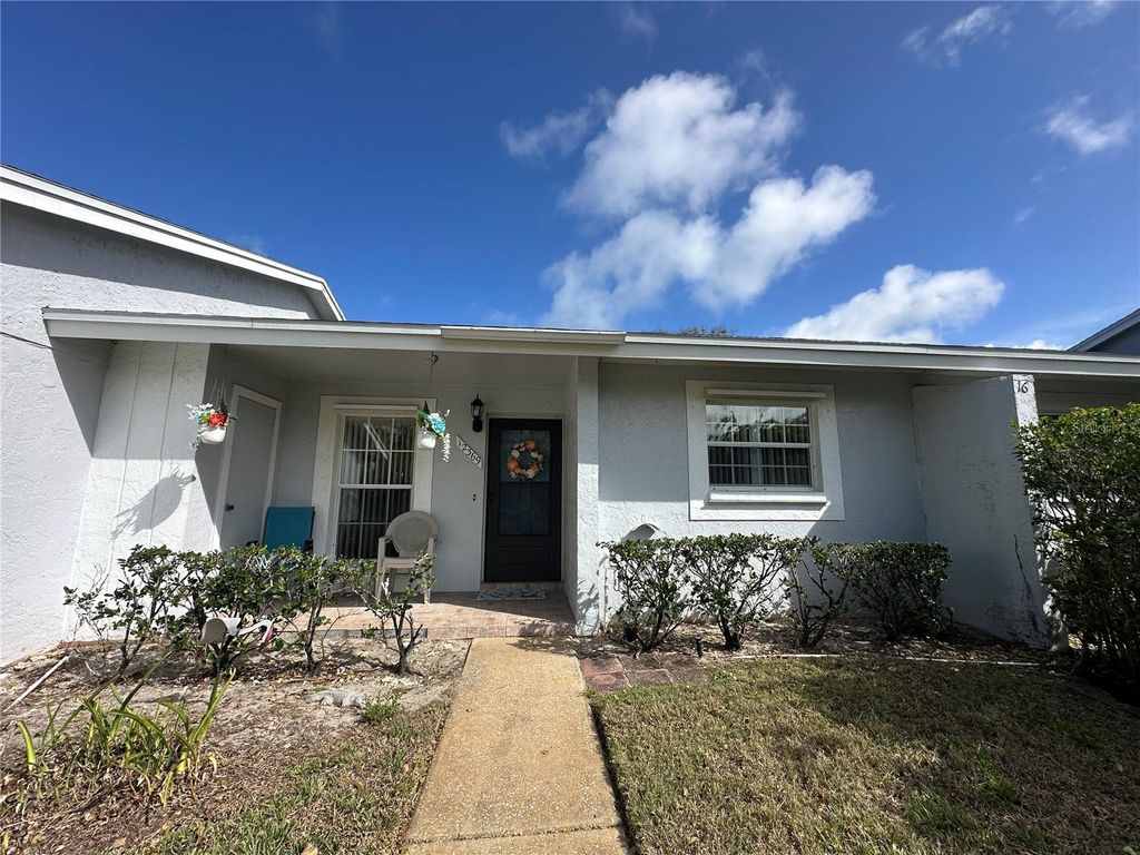 Photo of 12369 Dearborn Drive #C, Hudson, FL 34667 (MLS # W7883850)