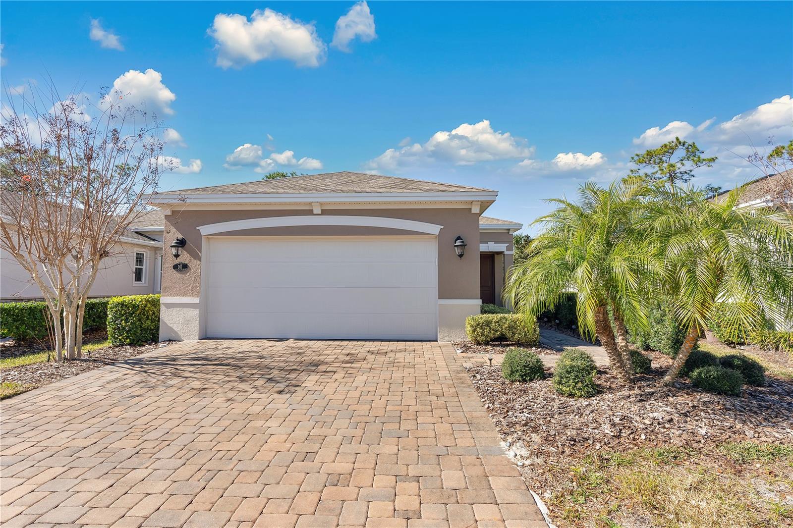This beautifully home offers the perfect mix of modern convenience and timeless charm. From the lush landscaping to the inviting front entry, you’ll feel right at home the moment you arrive. Inside, the spacious open floor plan features high ceilings and an abundance of natural light. The chef’s kitchen boasts stainless steel appliances, granite countertops, a large bar, and ample cabinet space, making it perfect for cooking and gathering. Plantation shutters add a touch of elegance throughout, while the whole-home water filtration system ensures comfort and quality at every turn. This home offers a luxurious primary suite complete with a walk-in closet, separate vanities, and a walk-in shower. Additionally, there is a second bedroom for guests or family and a versatile den/study, perfect for working from home or creating a cozy retreat. Step outside to your private backyard oasis, where you’ll find a covered patio perfect for relaxing with your morning coffee or evening sunsets. With no rear neighbors, this fenced yard offers peace, privacy, and space for outdoor activities or gardening. Located just minutes from Deland’s vibrant downtown, schools, shopping, dining, parks, and major highways, this home offers both convenience and community. Available with furniture. Schedule your tour today and experience why 161 Old Moss Circle is the perfect place to call home!