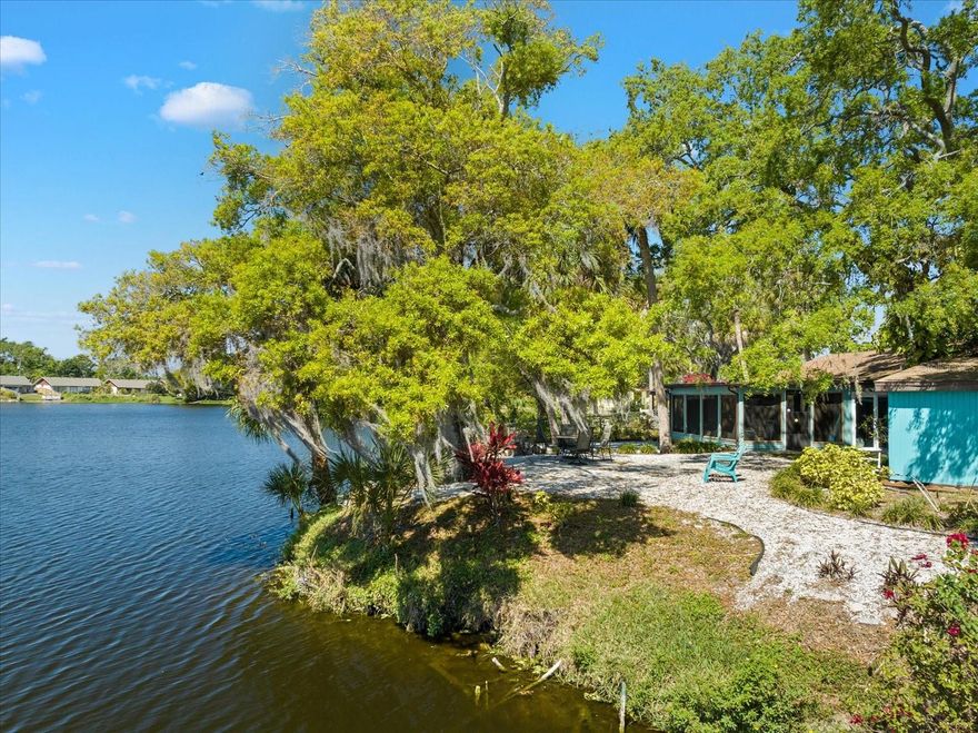 NOW AVAILABLE DECEMBER 1st for short term rental! Looking for a getaway with a beautiful view of Lake McCollum? Only 6 miles to Anna Maria Island! SUPER convenient location to shopping and restaurants! This paired villa offers 2 bedrooms, 2 bathrooms, dining room, eat-in kitchen, great room and large screened lanai. Watch beautiful sunsets from your lanai or enjoy your morning beverage in a peaceful setting watching nature. This is turnkey furnished and includes all utilities and internet! Super convenient location! $200 cleaning fee upon departure plus 13% resort tax/fees.  BOOKED JANUARY-APRIL 2026.