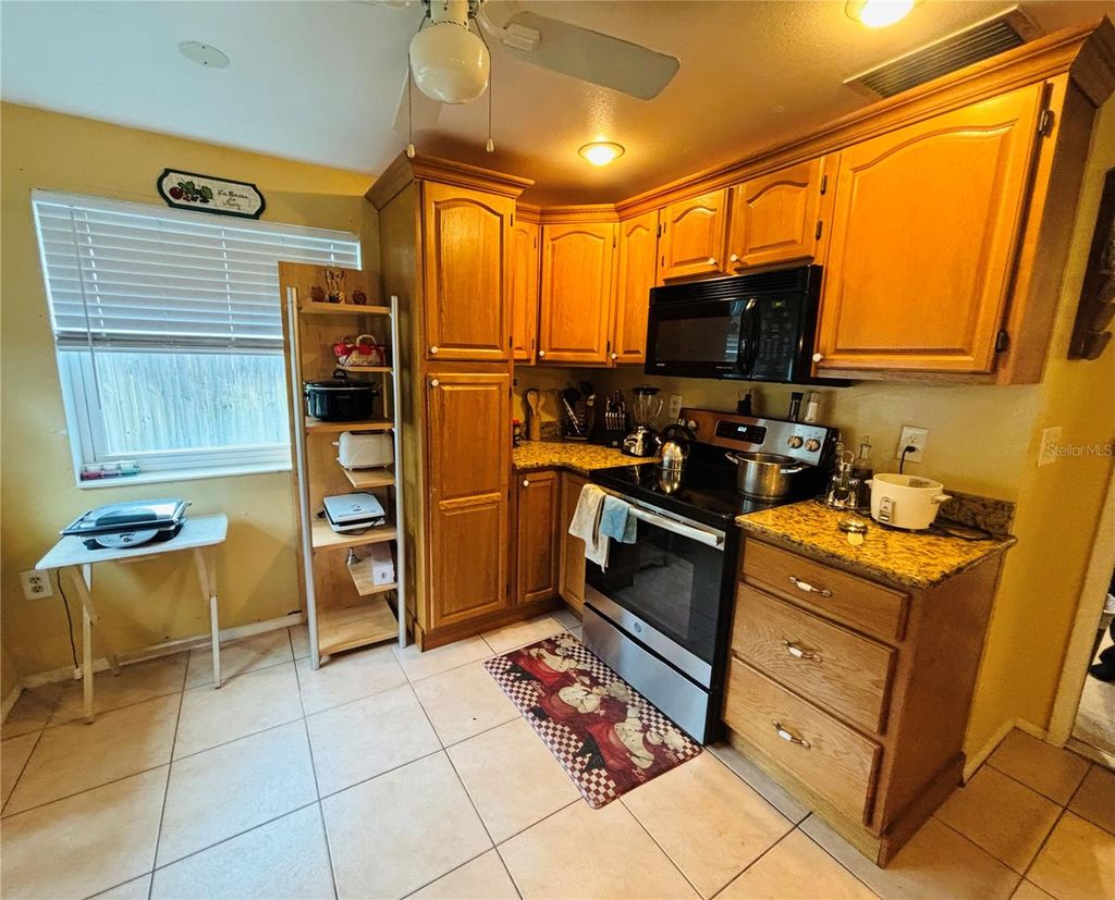 Photo of 6549 Creekview Terrace N, Pinellas Park, FL 33781 (MLS # TB8418631)