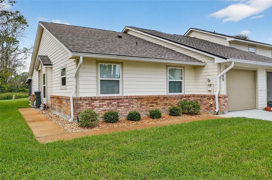 ***Motivated Seller*** Discover this end-unit 2-bedroom, 2-bath townhome for sale in the gated golf community of Pelican Bay in Daytona Beach, Florida. This spacious property features a 1-car garage, inside laundry room, breakfast nook, and a comfortable split floor plan with vaulted ceilings and skylights for natural light. Recent updates include HVAC (2014), roof (2024), windows (2024), and water heater (2024). The primary suite offers a walk-in closet and private bath, while the enclosed back lanai with its own A/C unit provides extra living space for year-round enjoyment. The kitchen includes a dining area and wet bar for entertaining. Flooring is a mix of carpet and tile, ready for your personal updates and design touch. Located steps from the community pool, tennis courts, and racquetball, this low-maintenance home is ideal for full-time living, a vacation retreat, or a rental investment near local colleges, shopping, beaches, and restaurants. Enjoy quiet living with only two units per building in sought-after Pelican Bay.