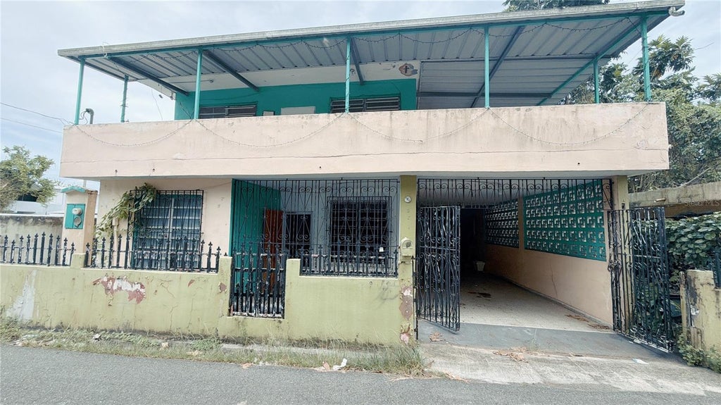 Photo of 14 Abra Del Pimiento Calle 6, Barceloneta, PR 00617 (MLS # PR9124178)