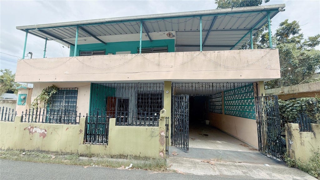 Photo of 14 Abra Del Pimiento Calle 6, Barceloneta, PR 00617 (MLS # PR9124178)