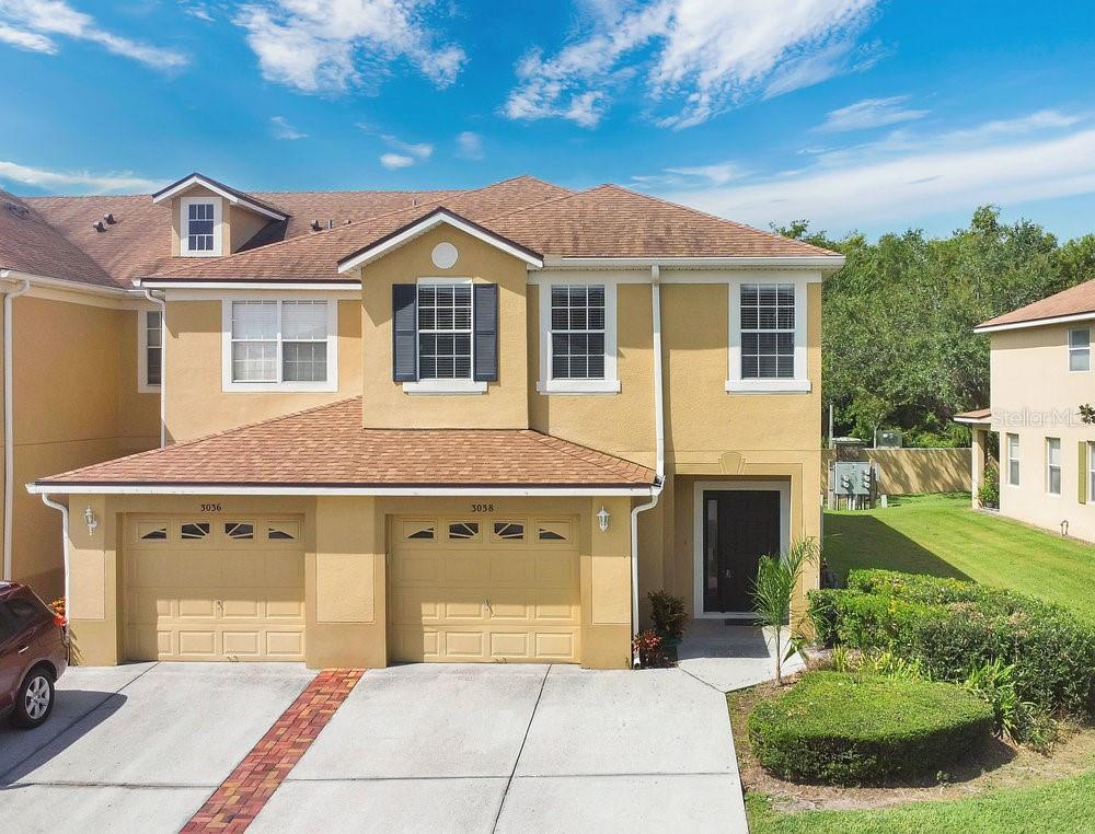 Welcome to this spacious corner-unit townhome, one of the largest floor plans in the community! Featuring 3 bedrooms, 2.5 bathrooms, and a 1-car garage, this home has been well maintained and is move-in ready. The first floor offers an extra-large living room, a bright eat-in kitchen, and a convenient half bath—perfect for entertaining. Upstairs, you’ll find all bedrooms, including a massive primary suite with a walk-in closet and ensuite bath, as well as two additional bedrooms, a second full bath, a large loft/office area, and a laundry room.
Enjoy the outdoors in the screened-in lanai, which backs up to the community wall for added privacy, and take advantage of the oversized storage closet. The Townhomes of Flora Ridge is a well-kept gated community that offers a very LOW HOA fee that includes ALL of the exterior maintenance. It is within walking distance to The Loop Shopping Plaza, Publix, dining, and more, with easy access to major highways, the airport, the theme parks, and endless shopping and entertainment options. Call for additional information and to schedule your showing today!