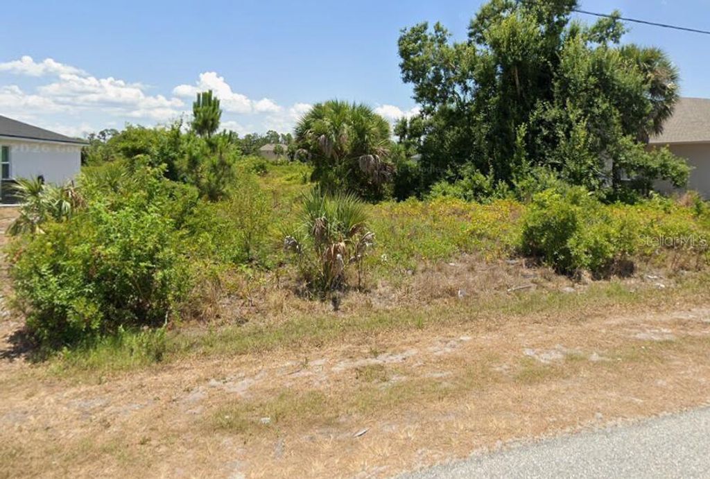 Photo of 9172 Agate Street, Port Charlotte, FL 33981 (MLS # O6402353)