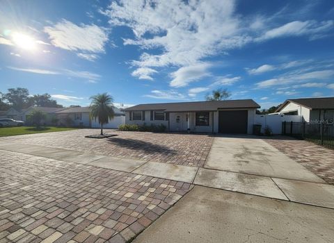 Photo of 7912 Woodvale Circle, Tampa, FL 33615 (MLS # TB8448492)