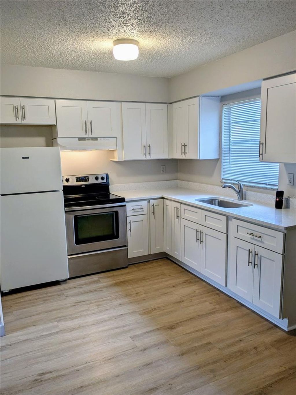 Photo of 620 Wildwood Way, Clearwater, FL 33756 (MLS # TB8473268)