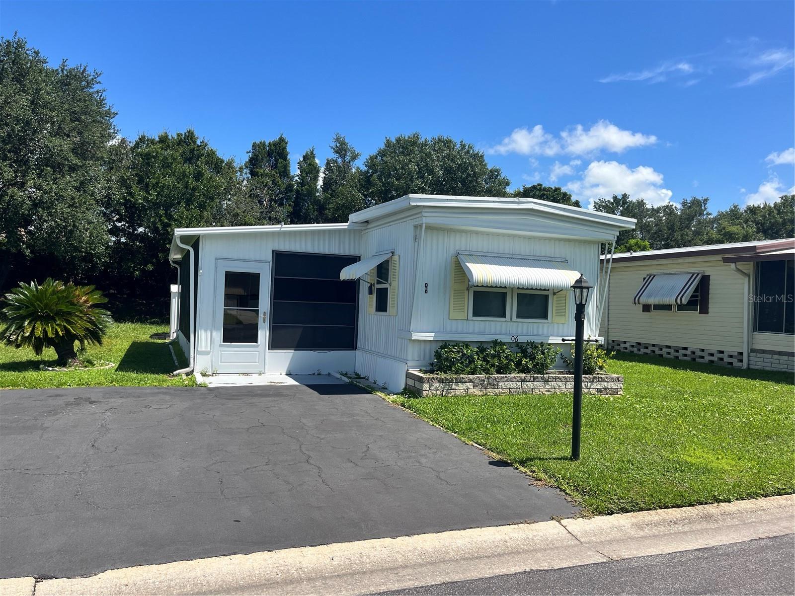 Motivated seller due to life changes...This singlewide 2 bedroom i bath home has been completely updated in the last couple years. Attractive laminate flooring through out the entire home. Updated kitchen with eating space and open to the living area. The two bedrooms are comfortable but on the smaller size. Come completely furnished and ready to move into. A large enclosed and covered lanai that has the stackable washer and dryer for your convenience. There is also a storage unit outside to keep your things in. Westwinds Community gives you a peaceful feeling as you tour the neighborhood. Friendly smiles and waves will immediately make you feel at home and EVEN ALLOWS 2 PETS. Numerous social activities give you a chance to meet your new friends and neighbors. With their fun scheduled activities of Dinners, and Community Trips. Lunches, Card games, Shuffleboard, Boccie Ball, Billiards & Cards, Play Horseshoes, Large Heated Community pool & Hot Tub. Westwinds offer Storage space with special pricing for their Residents with boats or RV's.