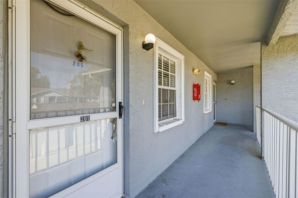 Photo of 1465 Millstream Lane #205, Dunedin, FL 34698 (MLS # TB8486748)