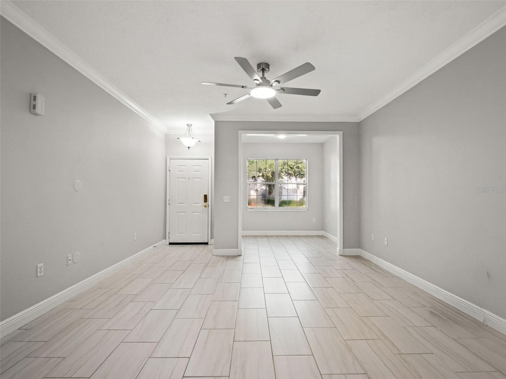Photo of 431 Southern Pecan Circle #101, Winter Garden, FL 34787 (MLS # O6439215)