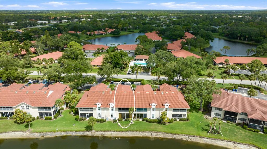 Photo of 5590 Golf Pointe Drive #5590, Sarasota, FL 34243 (MLS # A4694922)