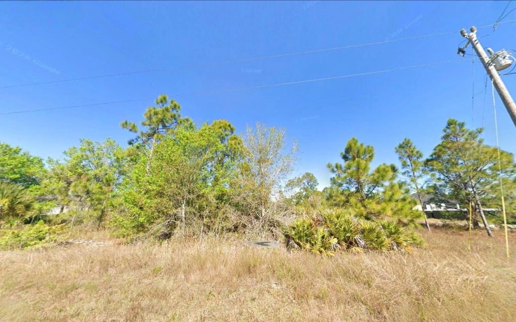 Photo of 761 Central Street E, Lehigh Acres, FL 33974 (MLS # TB8489097)