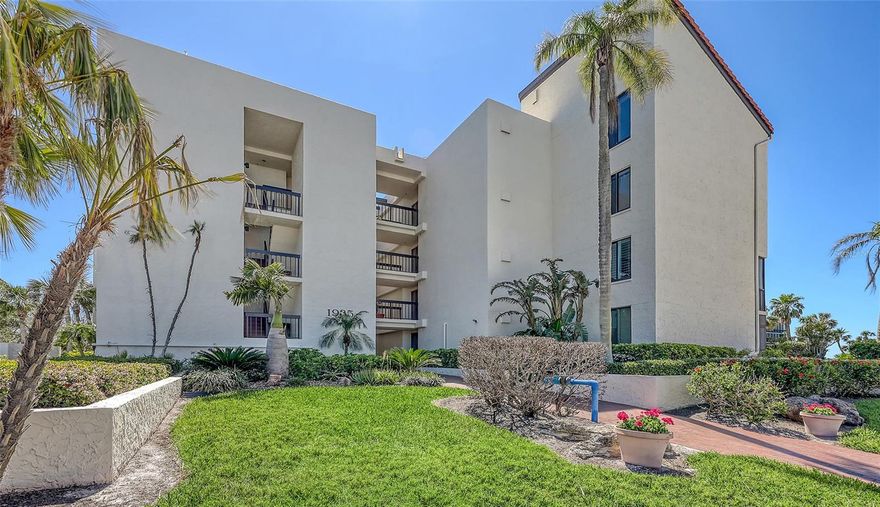 A must-see, this exceptional two-bedroom, two-bath penthouse is the only residence in Seaplace with no shared walls, offering unparalleled privacy and tranquility. Fully remodeled in 2019, the home features a designer kitchen with quartz countertops, custom cabinetry and premium appliances, seamlessly complemented by elegant soft grey laminate hardwood flooring throughout. A spacious lanai spans the length of the residence, filling the interior with natural light and picturesque garden views. Significant recent upgrades include a new air-conditioning system (2020) with added UV filtration (2024), hurricane-rated sliding doors in the primary suite and living room (2025) and a water heater (2020), all with transferable warranties. Additional highlights include floor-to-ceiling remote-controlled blinds, an in-unit full-size washer and dryer, and a reserved parking space. Seaplace offers a wealth of resort-style amenities, including two swimming pools, two hot tubs, a kiddie pool, Har-Tru tennis courts, a fitness center, a newly renovated clubhouse, beachfront grilling areas and private beach access. The 24-hour guard-gated community ensures security and exclusivity. Ideally just minutes from St. Armands Circle, this prime location provides convenient access to world-class dining, luxury shopping and Sarasota’s renowned cultural attractions. Whether you're seeking a full-time coastal residence, a seasonal getaway or a high-demand investment opportunity, this penthouse represents the finest in Longboat Key living. Schedule your private showing today!