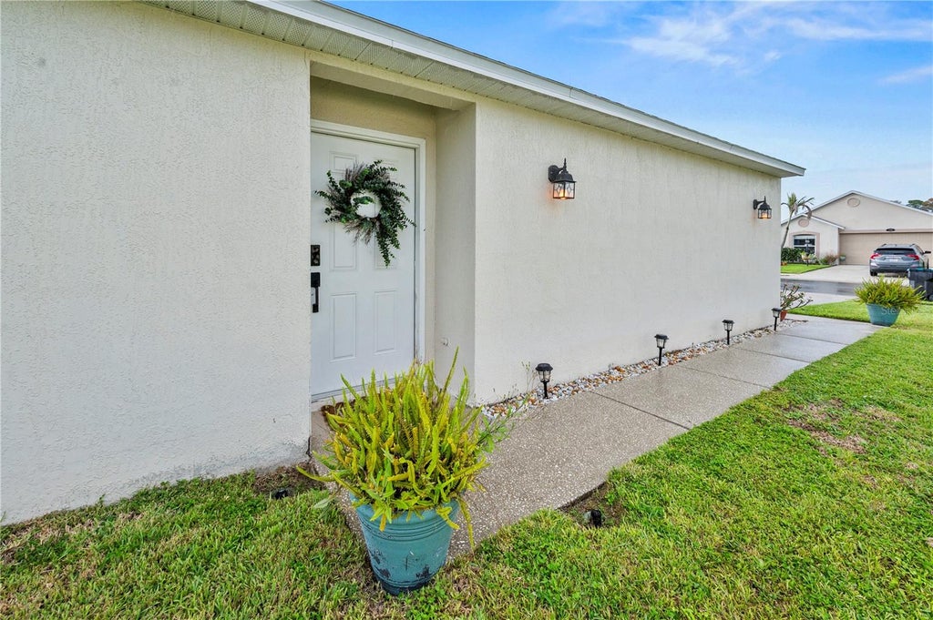 Photo of 2054 Majestic Pine Court NE, Palm Bay, FL 32905 (MLS # V4951420)
