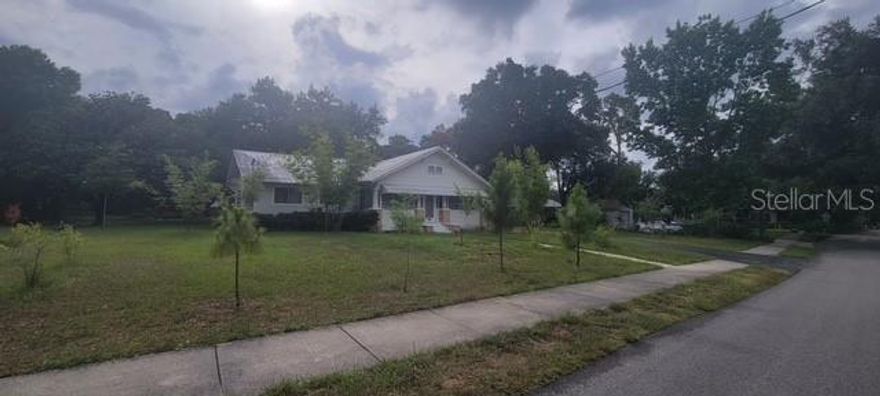 VALUE IS IN THE LAND!  House is a tear down - no entry.  CALLING ALL BUILDERS!  NO FLOOD ZONE, NO HOA, NOT IN A HISTORIC DISTRICT. It is highly unusual to find this kind of land for urban infill opportunities! .82 ACRES - 6 PLATTED LOTS OF RECORD.  Notice the additional parcel folio number. THIS PRICE INCLUDES ALL 6 LOTS!!  - THREE LOTS FACE 12TH ST AND 3 LOTS FACE NORTH ALONG THE UN PAVED ROAD WHERE THERE IS A SEWER TAP! See attachments for sewer tap location and survey.  Utilize the original plats and build 3 SFH facing 12th with front load garages, and build 3 SFH facing north with back load garages with access from the south alley.  Current home is on City Sewer.  ALSO - this property sits inside the City of Tampa Urban Villages zone - SO POTENTIALLY EXERCISE THE ABILITY TO BUILD UP TO 9 OR 10 SFH.  Just about 10 minutes to downtown Tampa.  THIS IS AN EXCELLENT OPPORTUNITY.  House has month to month tenancy. Feel free to walk the property during daylight hours.