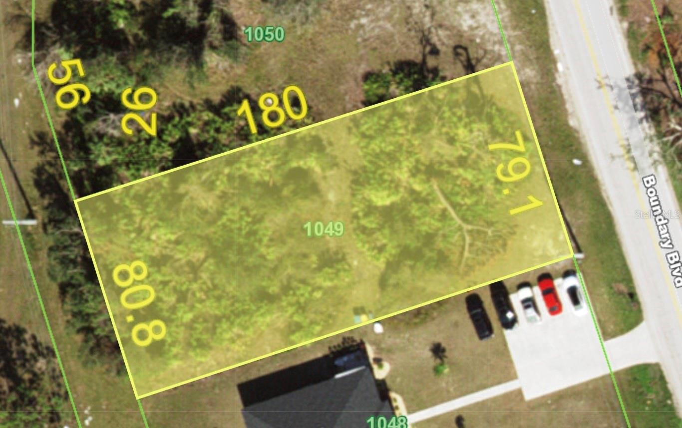 A beautiful multi-family lot. Central water, central sewer, electric, cable.