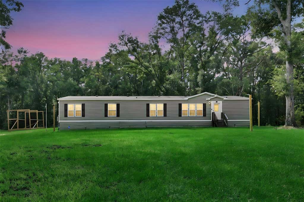 Photo of 21619 41st Drive, Lake City, FL 32024 (MLS # TB8541782)