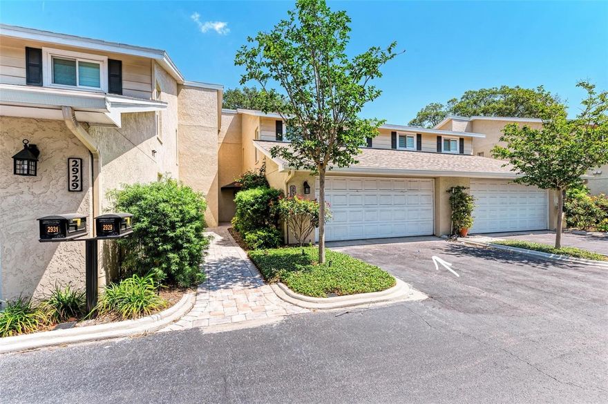 One or more photo(s) has been virtually staged. Welcome to South Tampa’s Hawthorn Pond, a small enclave of  10 town-homes located on a natural spring-fed pond. No Flooding has occurred! Incredible opportunity to sign an annual lease in October for this gorgeous 1833 SqFt two story 3br, 2 1/2 bath town-home with oversized 2 car garage. Enjoy peace and serenity from your large brick patio bordered by privacy walls and boardwalk overlooking a crystal clear spring fed pond with fish, birds, turtle and wildlife. The views of the ponds fountain and clear waters’ are abound from large picture windows with plantation shutters in living, dining, and master bedroom. You'll enjoy strolling on the boardwalk which meanders along the entire pond & property, including bridges that take you to the Banyan Tree Island. And, this location is a close proximity to Bayshore Blvd with sidewalks leading from Gandy Blvd to Bayshore Blvd. Features include newer wood floors throughout upstairs bedrooms and downstairs living areas, wood burning stone fireplace, new impact windows, new custom plantation shutters, and fresh paint throughout. The kitchen has brand-new stainless-steel appliances and a separate kitchen dining area. Upstairs, the master suite offers serene views on the pond side, w/new custom cabinets in the master bath & quartz vanity, separated from the additional 2 bedrooms & hall bath. Storage is abundant, storage under the stairs, walk-in closets, linen closet, and custom cabinets in the garage with work counter. Floor plans attached- All measurements to be verified. Tenant responsible for renters insurance, electric, & internet and applications for Hawthorn Pond association $50 per adult, with 7 day turn around, and credit check with Rent Spree  $39.99 per adult.  Minimum 680 credit score, min 50% debt ratio, and no subleasing. Possible to renew annual lease 1-3 years.