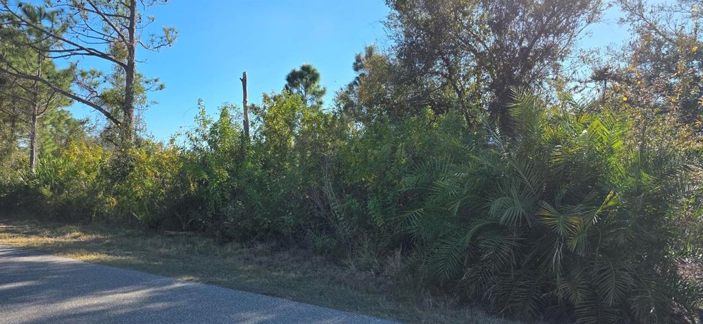 Photo of 5481 White Avenue, Port Charlotte, FL 33981 (MLS # C7521646)