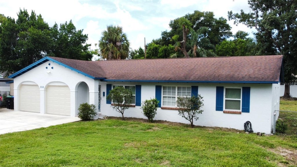 Photo of 5514 Turkey Lake Road, Orlando, FL 32819 (MLS # O6442250)