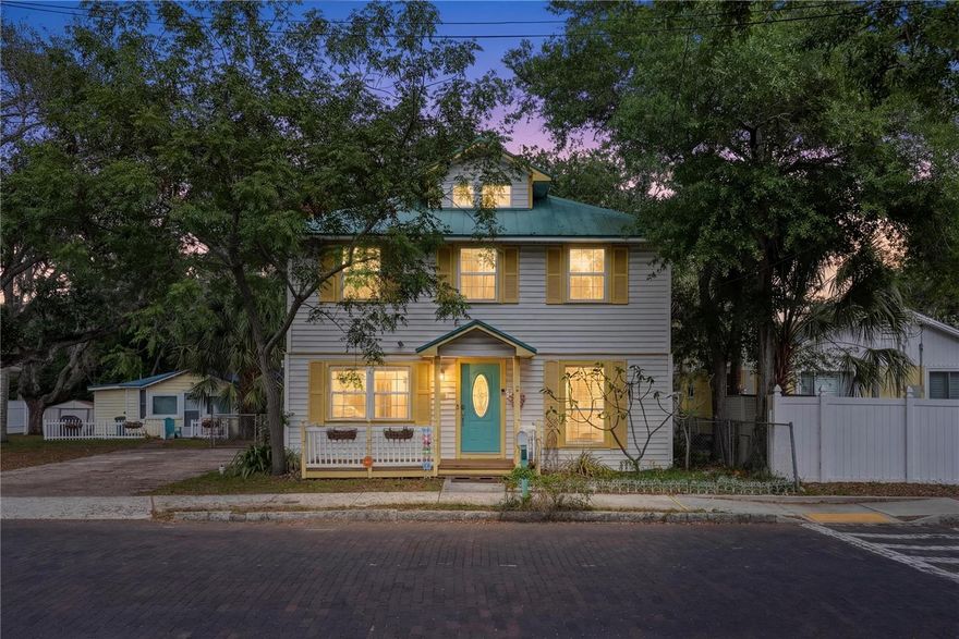 NO FLOOD ZONE. Rare opportunity just steps from downtown Safety Harbor on the coveted cobblestone stretch of 5th Avenue.

Originally built in 1925 during the height of the Sears & Roebuck catalog home era, this classic American Foursquare features the enduring craftsmanship of early 20th-century construction, including dense old-growth lumber known for its exceptional strength and longevity. While thousands of these homes were built nationwide, only a limited number of comparable early 20th-century homes remain in Florida today.

Featuring tall ceilings uncommon for homes of this era, the property offers a unique sense of openness and character throughout. Spanning over 2,700 square feet across three levels, the home offers 4 bedrooms, 3 bathrooms, bonus/flex spaces, a loft, and a layout ideal for buyers seeking something distinctive and full of personality. The primary suite features a private balcony, dual walk in cloests and a remodeled bathroom retreat.

Inside, you’ll find an open kitchen with an island, dedicated laundry room, elegant laminate flooring, and a wood-burning fireplace with a chimney that adds warmth and historic charm to the living space. Flexible living areas throughout the home provide endless possibilities for guest space, offices, creative studios, or additional entertaining areas.

Outside, a welcoming back patio overlooks the spacious backyard, offering endless potential to create your own outdoor retreat, whether it’s a garden, entertaining space, or future vision. A long-lasting metal roof adds additional value and peace of mind, while the cobblestone street setting enhances the home’s undeniable charm and sense of arrival.

Walkable homes this close to downtown Safety Harbor are exceptionally rare. Just four blocks from restaurants, coffee shops, the pier, live music, art festivals, boutiques, Third Friday celebrations, and the world-famous Safety Harbor Spa.

Whether you’re looking to restore, personalize, invest, or simply own a truly distinctive property in one of Tampa Bay’s most beloved waterfront towns, opportunities like this rarely come available.