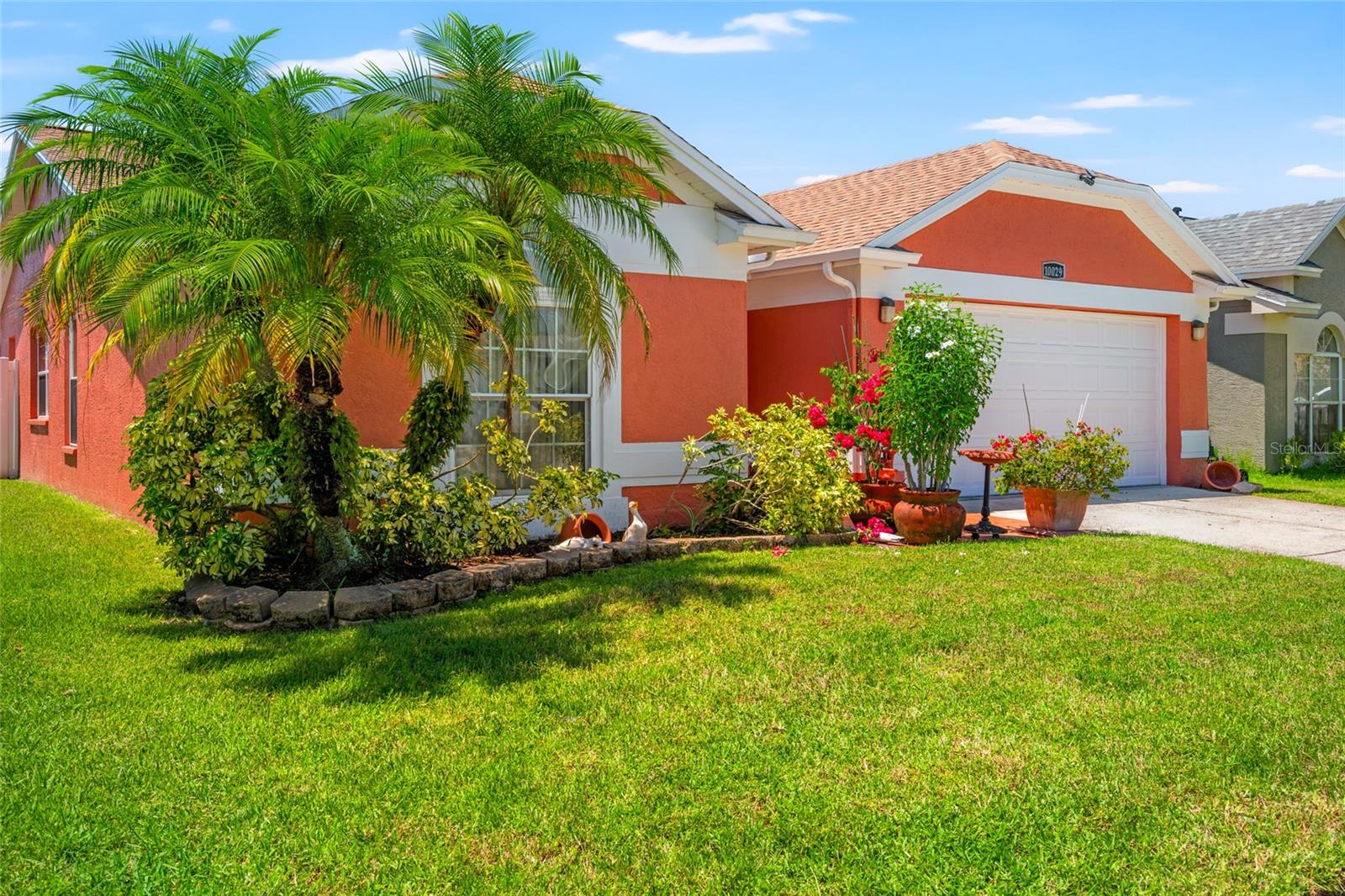 Location, location, location! Move in ready 3 bedrooms, 2 bathrooms home, owned by the original owner and located in sought after Wildewood neighborhood of Plantation in the heart of Tampa! This well maintained property features a brand new roof (2024) and new AC (2024). Inside, you’ll find all tile flooring perfect for Tampa’s allergy season and a bright, functional layout. Enjoy outdoor living year round with a large covered and screened patio, ideal for entertaining or relaxing. The home also includes a spacious 2 car garage, no CDD, and a low HOA. Most windows have been replaced. Homes like this are a rare find, offering both convenience and comfort just minutes from shops, dining, and major highways. Don’t miss this gem!