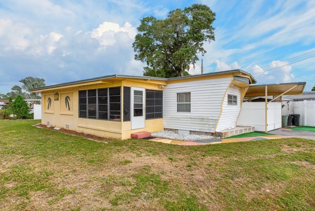 Photo of 1744 Hoyle Drive, Holiday, FL 34691 (MLS # TB8561776)