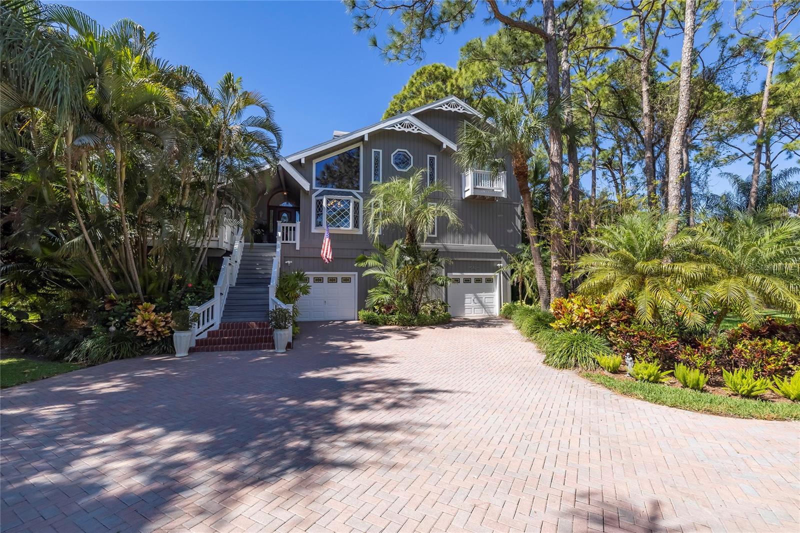 Auction Property. ************ AUCTION!!!! SAT SEPT 20th @ 12 Noon. Sold free and clear of all liens. List price is the opening bid. Auction held live on site at the property . Public is welcome to participate. *************VERY, VERY UNIQUE ............. This home has it all!! Waterfront! 5 Bedrooms! Decks and Outdoor Living areas galore! Outdoor Kitchen! Beautiful Pool and Spa! Home Theater! And land, The adjacent buildable 80 x 112 lot is also available. A Rare find, WATERFRONT with NO BRIDGES in the heart of Palm Harbor. A meticulously maintained, PRIVATE, 5 Bedroom 4 1/2 Bath home with an immaculate Pool/ Heated Spa, Outdoor Kitchen, HUGE GARAGE, Home theater, Bonus room (gym, Office or?) From this magnificent home you will walk down your private mangrove and tree lined composite walkway to your private dock with boatlift and room for other toys. From here, you have a straight shot to the Gulf or along the coast for scenic or sport exploration. Just minutes away are Palm Harbor top rated schools, Honeymoon Island/Beach, restaurants, shopping and recreation galore. Opportunity is knocking!!! Answer the call!!! An additional lot adjacent to this home is also available.