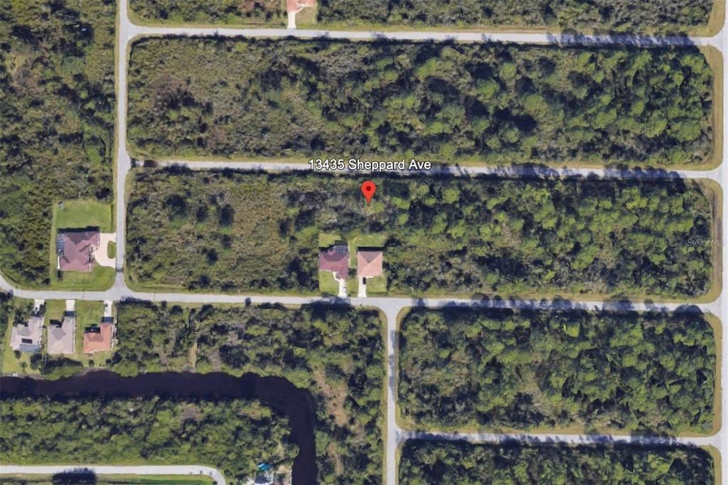 Photo of 13435 Sheppard Avenue, Port Charlotte, FL 33953 (MLS # C7520373)