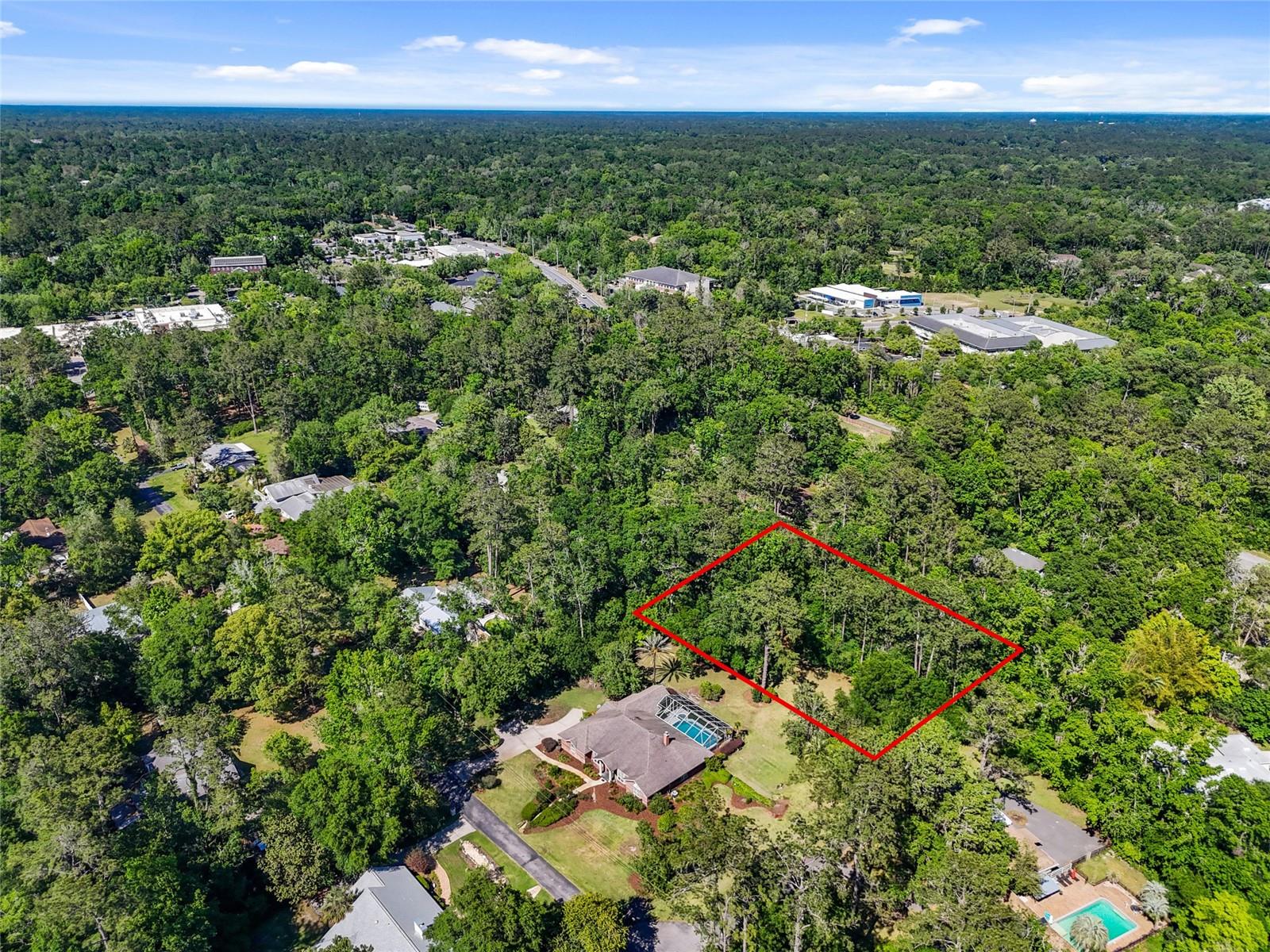 If you are looking for the perfect place to build your dream home- look no further. This gorgeous .68 acre lot will blow you away!! Tucked away at the very end of a private street, yet walking distance to restaurants, gyms, salons, movie theaters, and more! Perfectly located just minutes to UF, Shands, and North Florida Regional hospital. This is one of the very last opportunities you will ever have to build in this location- don’t miss out!