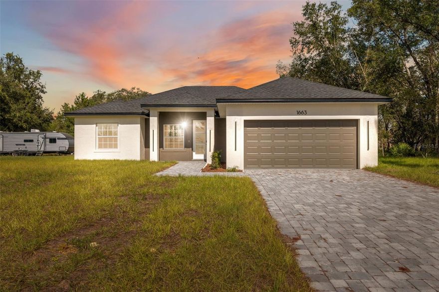 Modern New Construction Home in Prime Ocala Location

Discover this stunning new construction home in the heart of Ocala, combining modern design with everyday comfort. Featuring 4 spacious bedrooms and 3 full bathrooms, this residence offers an ideal layout for families or those who love to entertain. The primary suite includes a luxurious walk-in closet, while the additional bedrooms feature built-in closets for ample storage.

The open-concept floorplan creates a seamless flow between the living room and dining area, both filled with natural light and enhanced by sliding glass doors that open to a covered rear porch, perfect for relaxing or hosting gatherings year-round. The elegant kitchen showcases solid wood cabinets, stone countertops, and modern appliances—a beautiful and functional space for cooking and connection.

A 2-car attached garage provides convenience and extra storage, while the home’s location adds tremendous value—situated near a main road for easy commuting and close to top-rated schools, shopping, and dining options.

This home offers a blend of style, functionality, and location—an ideal choice for those seeking a fresh start in one of Ocala’s most desirable areas.