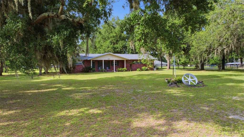 Photo of 7440 SW 83rd Place, Ocala, FL 34476 (MLS # O6407378)