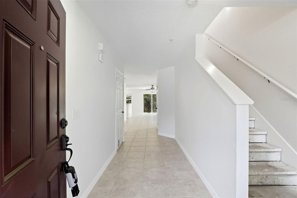 Photo of 521 Interlude Lane #H, Orlando, FL 32824 (MLS # O6345274)