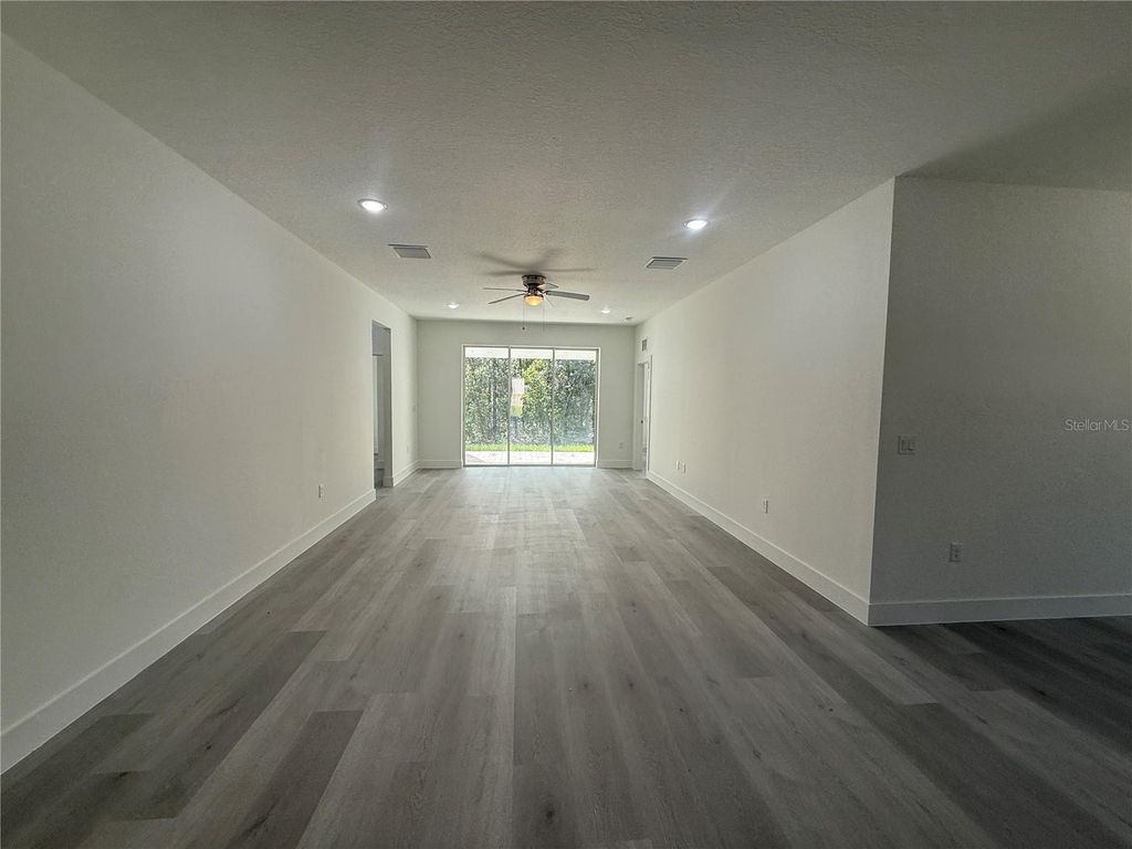 Photo of 10034 N Darwin Way, Citrus Springs, FL 34434 (MLS # O6355995)