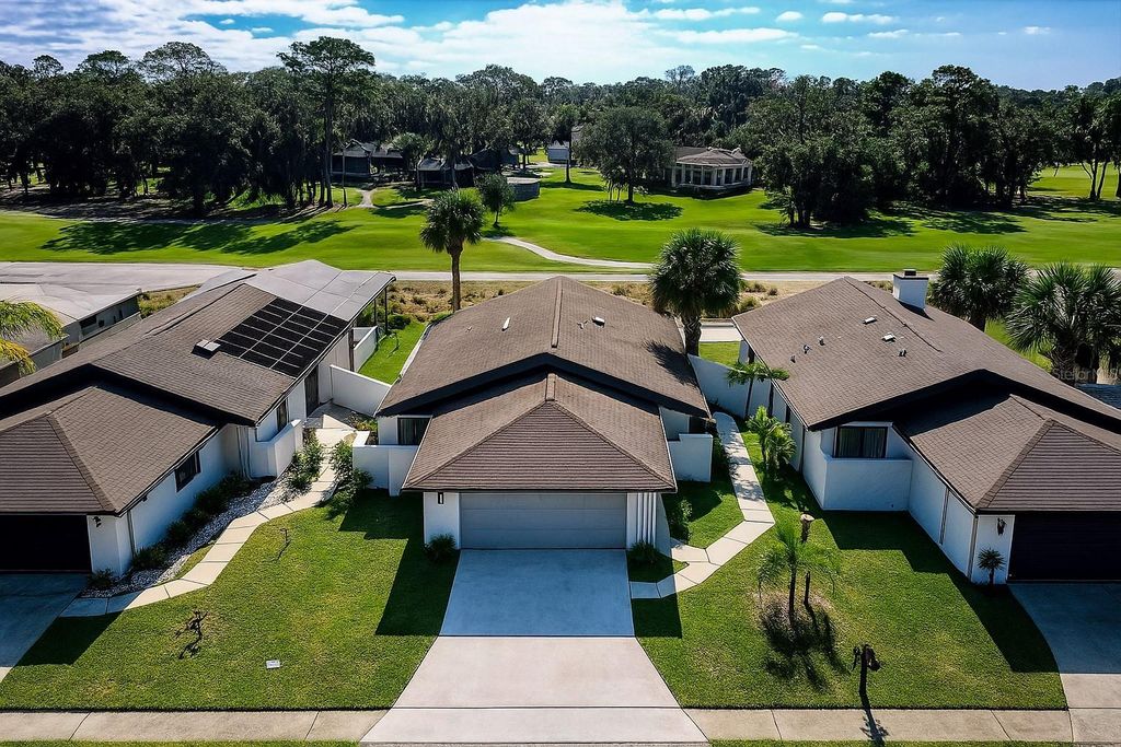 Photo of 83 Club House Drive, Palm Coast, FL 32137 (MLS # FC311167)