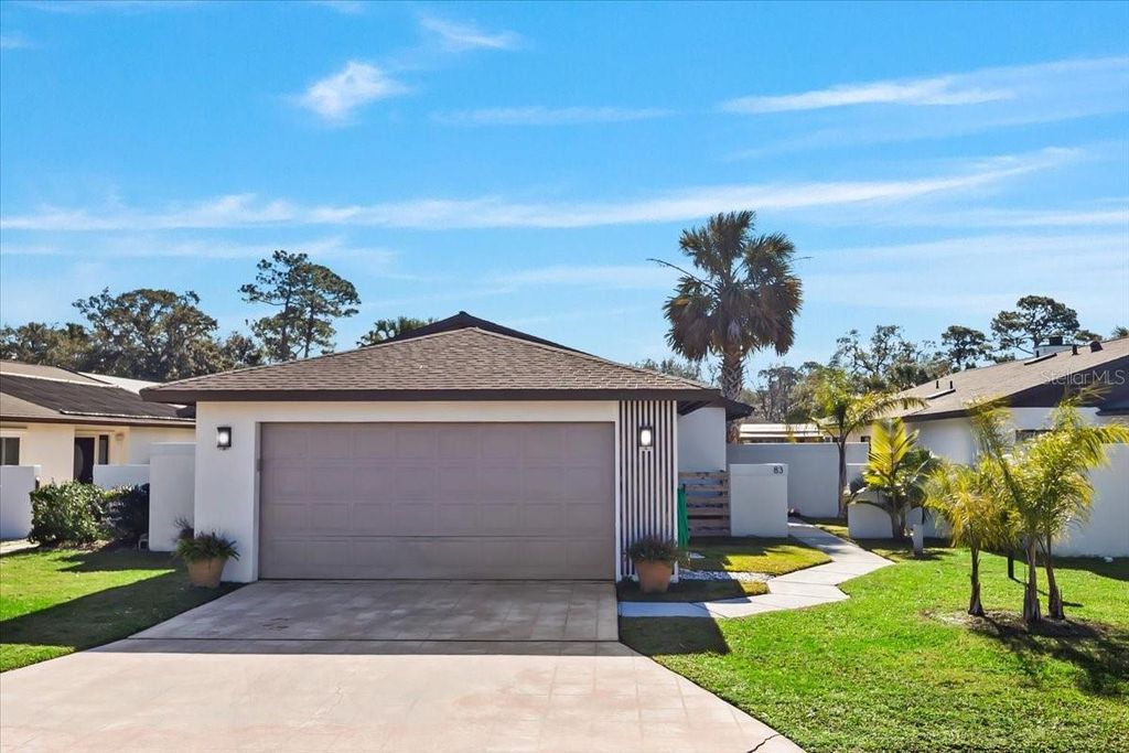 Photo of 83 Club House Drive, Palm Coast, FL 32137 (MLS # FC311167)