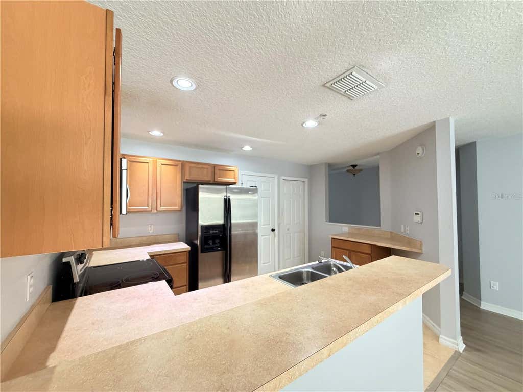 Photo of 290 Glowing Peace Lane #52, Orlando, FL 32824 (MLS # O6422914)