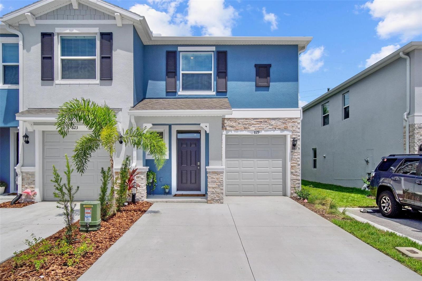 Welcome to Bayside Pointe—Clearwater’s newest townhome community! This beautifully appointed end-unit townhome at 829 Horizon Way offers the perfect combination of modern convenience, quality construction, and an unbeatable location.
Featuring 3 spacious bedrooms, 2.5 bathrooms, and a 1-car garage, this two-story concrete block home boasts an open-concept layout ideal for both relaxing and entertaining. The luxury vinyl flooring adds style and durability throughout the main living areas.
The kitchen is outfitted with brand-new stainless steel appliances, sleek finishes, a spacious walk-in pantry, and smart home features to elevate your everyday living. Upstairs, the spacious primary suite includes an ensuite bath and two walk-in closets, while the inside laundry area offers added convenience.
Enjoy your morning coffee or unwind in the evenings in the enclosed screened patio—perfect for Florida living. This home is located in a non-flood zone and is just minutes from top-rated beaches, dining, shopping, and entertainment.
Additional highlights include underground utilities, smart home technology, and the unique privacy of being the only end unit currently available in the community.
Seller relocation makes this a rare opportunity to purchase a nearly new home without the wait of new construction.
Bonus: This property includes a transferable home warranty valid through March 2026, offering added peace of mind for the next owner.
Don’t miss your chance to own in this brand-new, sought-after neighborhood—schedule your private showing today!