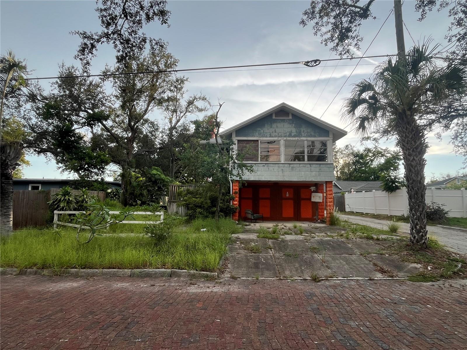 Redevelopment Opportunity in Prime St. Pete Location
Located in one of St. Petersburg’s most accessible and rapidly evolving corridors, 121 48th St N presents a rare opportunity to reimagine and rebuild. This property currently features an existing structure in need of full renovation or removal—offering a clean slate for your next project.
Tear-Down Redevelopment Lot with Alley Access – Ideal for Townhomes, Single family, or SFH + ADU.
Located in a prime central corridor of St. Petersburg, this .1-acre lot (approx. 50' x 91') presents a rare redevelopment opportunity just north of Central Ave. Buyer to verify all measurements, zoning, ect. Please exercise caution if visiting property. The stairs are rotten and house presents hazards.