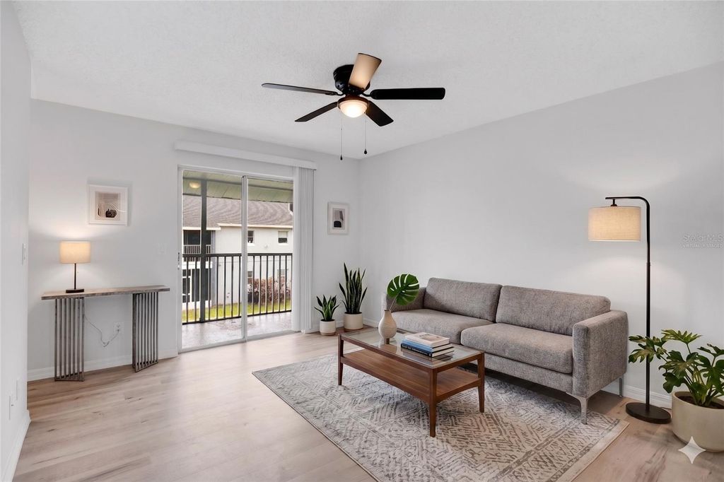 Photo of 4100 Pershing Pointe Place #3, Orlando, FL 32822 (MLS # O6402095)