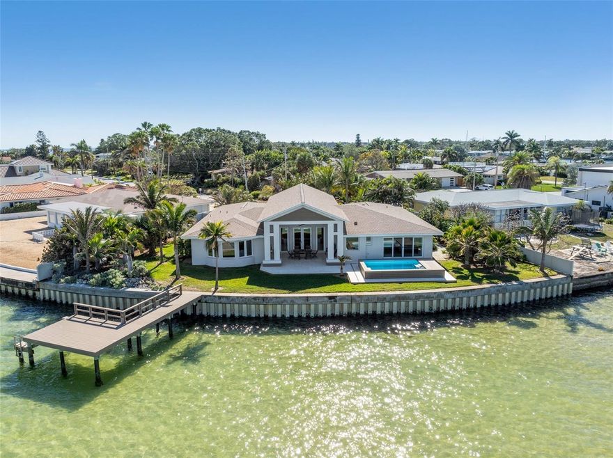 PENDING!!! ACCEPTING BACKUP OFFERS. Welcome to Beautiful Tropical Shores! This Fully Remodeled & Updated Dream Home is Located on Wide Open Tampa Bay with Undeniably The Best Combo Views of Both Unobstructed Tampa Bay, The Downtown St.Petersburg & Tampa Skyline. A Huge List of High Quality / Custom Updates from 2017 are as follows... Shell Reef Limestone Tile Flooring, Brazilian Granite "Patagonia" Counters Throughout, PGT Impact Windows, Sliders, Vinyl Seawall & Dock, Entry Doors, & French Doors, Level 5 Smooth Drywall Finish, Floating Bath Vanities, Soft Close Custom Cabinetry, High Quality Jenn-Air Stainless Appliances W/ 5 Burner Induction Top, Full Bath Remodels w/ Zero Entry Walk-in Showers & Frameless Glass Enclosures, Epoxy Coated Garage Floor, & Sleek Wall- Mounted Gas Fireplace. The Home is also Equipped with an Endless Heated Sport Pool with Swim Current & Treadmill. The Custom Landscape Features Numerous Exotic Palms, rainbow eucalyptus, Barbados Cherry, Banana,  and more! Local St.Petersburg Hangouts like The Storied Chataways Grill, Old SE Market, Lasing Park, & Newly Added Mullets are all within a Mile from this lovely home. You Can Hop on your golf cart or Bicycle for a downtown Sunday Brunch, Take in a Show at The Mahaffey Theater or Jannus Live, Check out The Multiple Arts at The Dali Museum, Fine Arts Museum, Craft Museum or The Recently Remastered & highly desired St.Petersburg Pier. Schedule a Tour To Have Your Socks Knocked Off