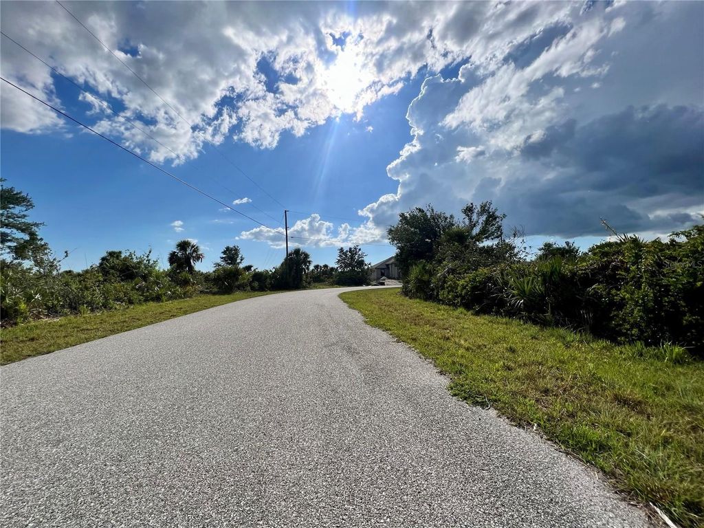Photo of 14298 Montmarte Avenue, Port Charlotte, FL 33981 (MLS # C7515180)
