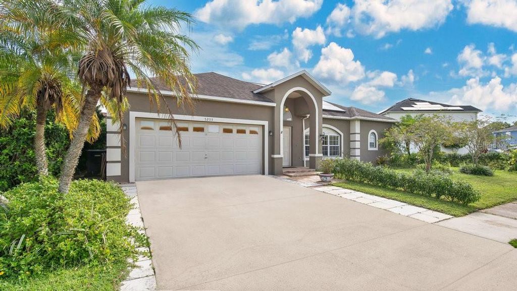 Photo of 5203 Jasmine Trace Lane, Kissimmee, FL 34758 (MLS # O6403135)