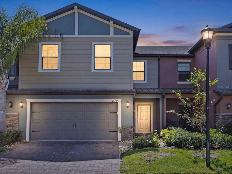 Absolutely Stunning 3 BR + LOFT/2.5 BA /2-Car Garage townhome in the highly desirable GATED community of Hidden Oaks. This beautiful townhome has been recently remodeled with gorgeous high-end Luxury Vinyl Plank (LVP) flooring throughout the entire upstairs (NO CARPET!) and features all the modern upgrades, combined with a great central location and fantastic schools. NOT IN A FLOOD ZONE. As you arrive, the home features a gorgeous brick paver driveway & entrance with a TWO-CAR GARAGE and LOTS OF STORAGE from both the shelving and the ceiling drop-down storage racks!  The downstairs is open & bright  and features high ceilings and contemporary 16" tile throughout. With a gorgous open floor-plan  kitchen with 36" dark mocha wood cabinetry, high-end granite countertops, custom stone backsplash, breakfast bar with pendant hang-down lighting & Stainless Steel appliance pkg. Enjoy the beautiful Florida weather from the fully screened patio enclosure which overlooks a serene conservation area. The upstairs LOFT is open & spacious, and could possibly be used as an office, media, or gym area.  The master bedroom is large with a walk-in closet, and an ensuite bathroom with matching hardwood cabinetry & granite, his & hers sinks, soaking tub, and separate shower.  Dedicated laundry room with WASHER & DRYER INCLUDED!  Hidden Oaks is a gated community central to the Veterans Expressway, and the many shops and restaurants nearby, and is zoned within the "A Rated" Steinbrenner (HS), Martinez (Middle), Schwarzkopf (Elementary) School district, which are some of the best schools in the County. Water, Trash, Sewer, and all Exterior maintenance is included. Truly a beautiful home.  Our application process is quick & easy.  Apply today!