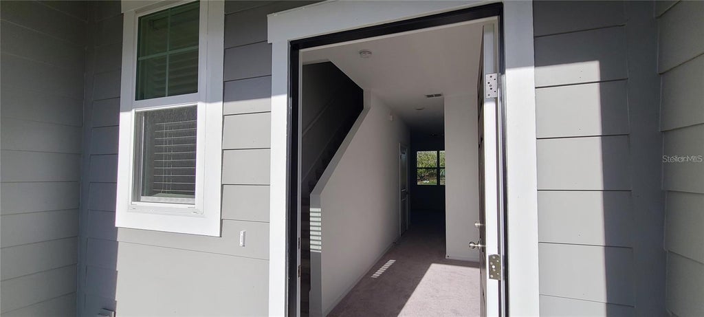 Photo of 393 Madison Drive, Davenport, FL 33837 (MLS # O6421290)