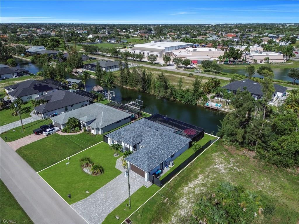 Photo of 2127 SW 17th Pl, Cape Coral, FL 33991 (MLS # TB8554230)