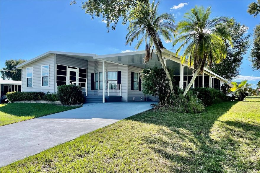 Charming Florida retreat nestled in the peaceful Knoll-Century Hill community. This beautifully updated, move in ready home sits on owned land with no lot rent, offering full ownership and added privacy.

The inviting front porch deck provides a great spot to relax, and inside you’ll find brand new luxury vinyl plank flooring throughout. The renovated Florida room is filled with natural light and serves as a versatile second living space, perfect for relaxing or entertaining year round. It also includes an enclosed lanai, allowing you to enjoy the outdoors comfortably in any season.

Additional updates include a new washer and dryer. Outside, the home features a covered carport and two storage sheds, providing ample space for parking, tools, and extra storage. This is Florida living done right. Schedule your private showing today!