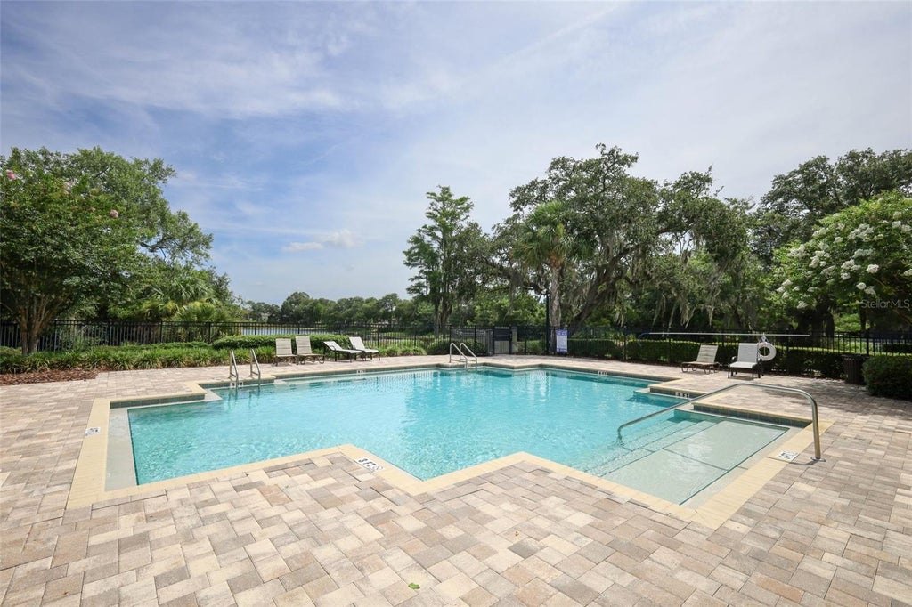 Photo of 3802 Bishop Landing Way, Orlando, FL 32824 (MLS # O6418353)