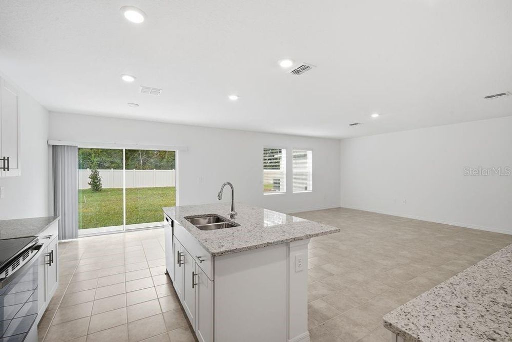 Photo of 13245 Tropical Breeze Way, Hudson, FL 34669 (MLS # TB8396167)
